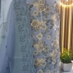 Unstitched pakistani indian alpine chikenkari embroidered winter suits .