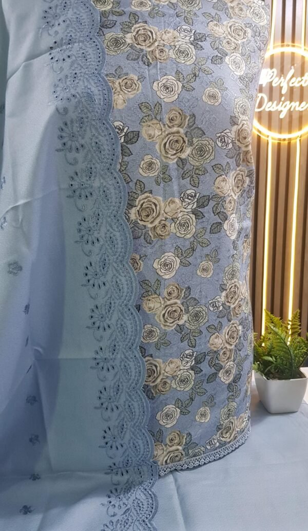 Unstitched pakistani indian alpine chikenkari embroidered winter suits .